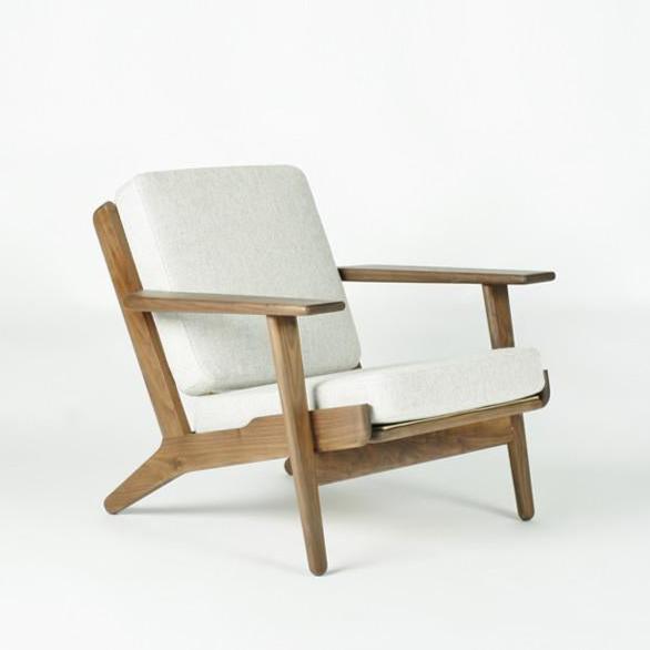 white wooden lounge chair